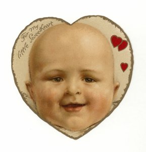 Visage de bébé dans un cœur