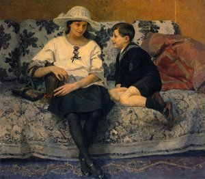 Une jeune fille et un jeune garçon sur un canapé