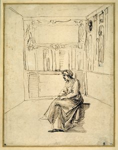 Une femme assise dans une pièce