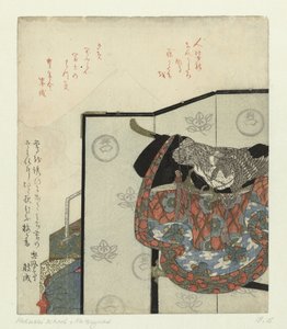 Un paravent avec un kimono sur un support