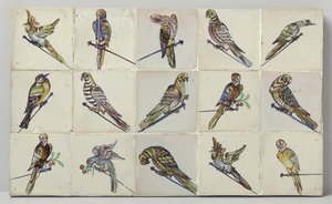 Panneau de carreaux avec oiseaux perchés sur des clous