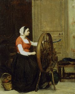 Femme et roue à filer