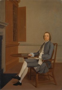 Un homme inconnu assis à une table