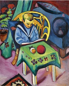 Garçon avec livre et jouets