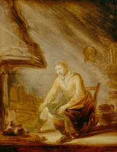 Femme devant un feu
