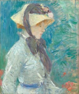 Jeune femme avec un chapeau de paille