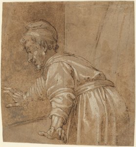 Un homme regardant par la fenêtre