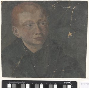 Tête de garçon aux cheveux roux