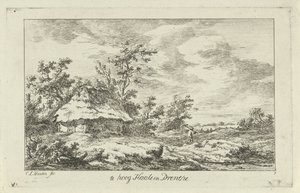 Homme avec un râteau près d