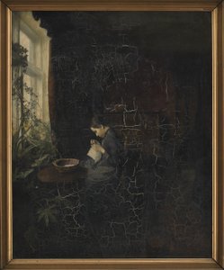 Intérieur avec une fille cousant