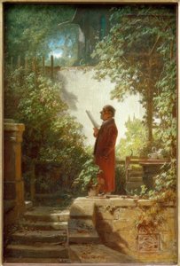 Lecteur de journaux dans le jardin