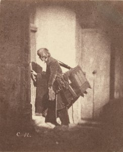 [Organ Grinder at 21, quai Bourbon, Ile Saint-Louis, Paris]