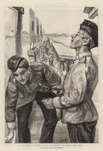 Au travail dans les cibles à Bisley, marquant les coups
