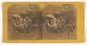 [Groupe familial devant un chariot, le père et l