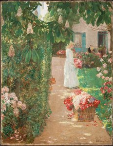 Cueillir des fleurs dans un jardin français