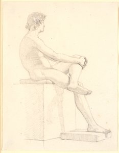 Jeune modèle masculin assis