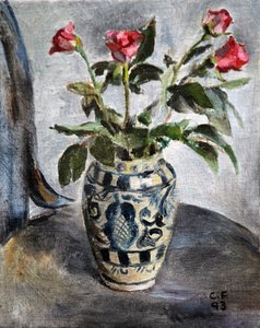 Roses roses dans un pot peint