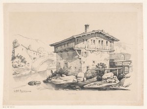Maison et moulin à eau dans un village de montagne
