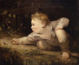 Garçon jouant aux billes
