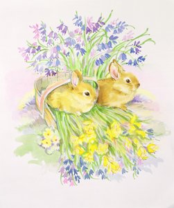 Lapins dans un panier avec des jonquilles et des jacinthes des bois