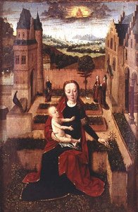 Madonna et enfant assis sur un mur