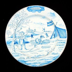 Assiette en faïence de Delft représentant le mois de décembre