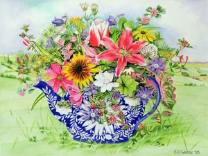 Théière bleue et blanche avec lys