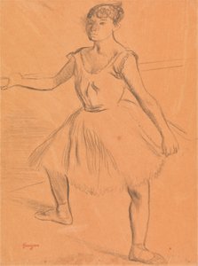 Ballerine debout à une barre