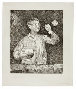 Garçon soufflant des bulles de savon