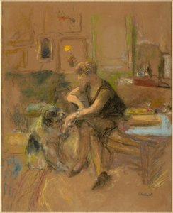 Gabrielle Jonas jouant avec un chien