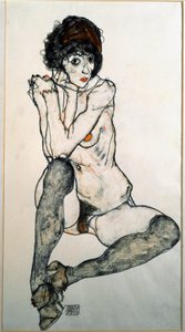 Femme nue assise