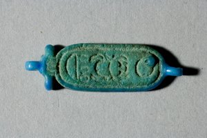 Perle avec le cartouche de Toutankhamon, Nouvel Empire, règne de Toutankhamon, 1336-27 av. J.-C. (faïence)