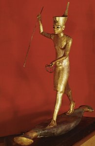Tutenkhamon debout sur un bateau plat et lançant un harpon (bois guilloché) - Egyptian 18th Dynasty