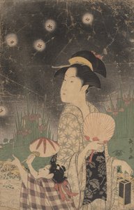 Femme et enfant attrapant des lucioles
