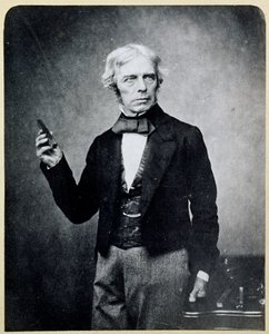 Michael Faraday tenant un aimant en barre, par Maull et Polyblank