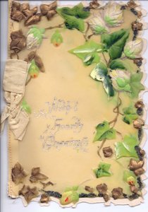 Carte de vœux en plastique avec du lierre doré et vert embossé et un nœud beige, vers 1910