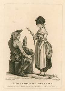 Une femme de chambre achetant un poireau