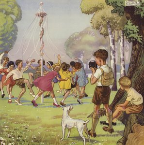 Garçon filmant des enfants dansant autour d