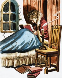 Garçon lisant au lit
