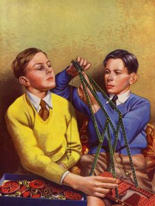 Garçons construisant avec un jeu de construction