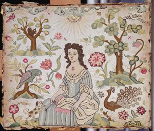 Panneau brodé représentant une dame dans un jardin, vers 1700
