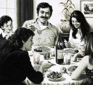 Famille italienne mangeant des spaghettis pour le dîner
