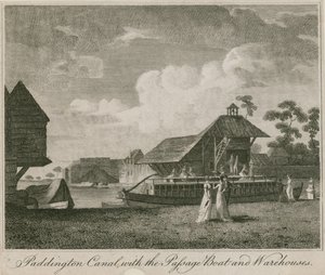 Canal de Paddington, Londres, avec le bateau de passage et les entrepôts