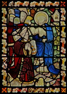La fenêtre est représentant Saint Pierre baptisant un jeune homme