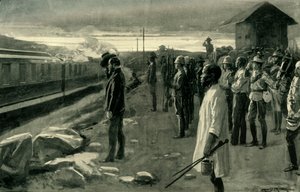 Le train transportant les restes de M. Rhodes salué par les gardes du blockhaus