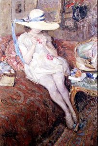 Jeune fille avec un chapeau de paille