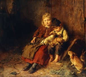Deux enfants jouant avec des lapins
