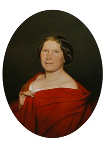 Femme avec un manteau saumon