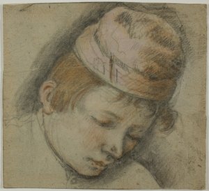Tête de jeune homme avec un bonnet rose
