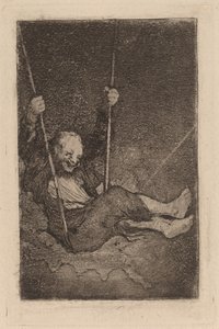 Vieil homme sur une balançoire